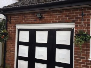 Image showing a garage door before the garge was converted into a room